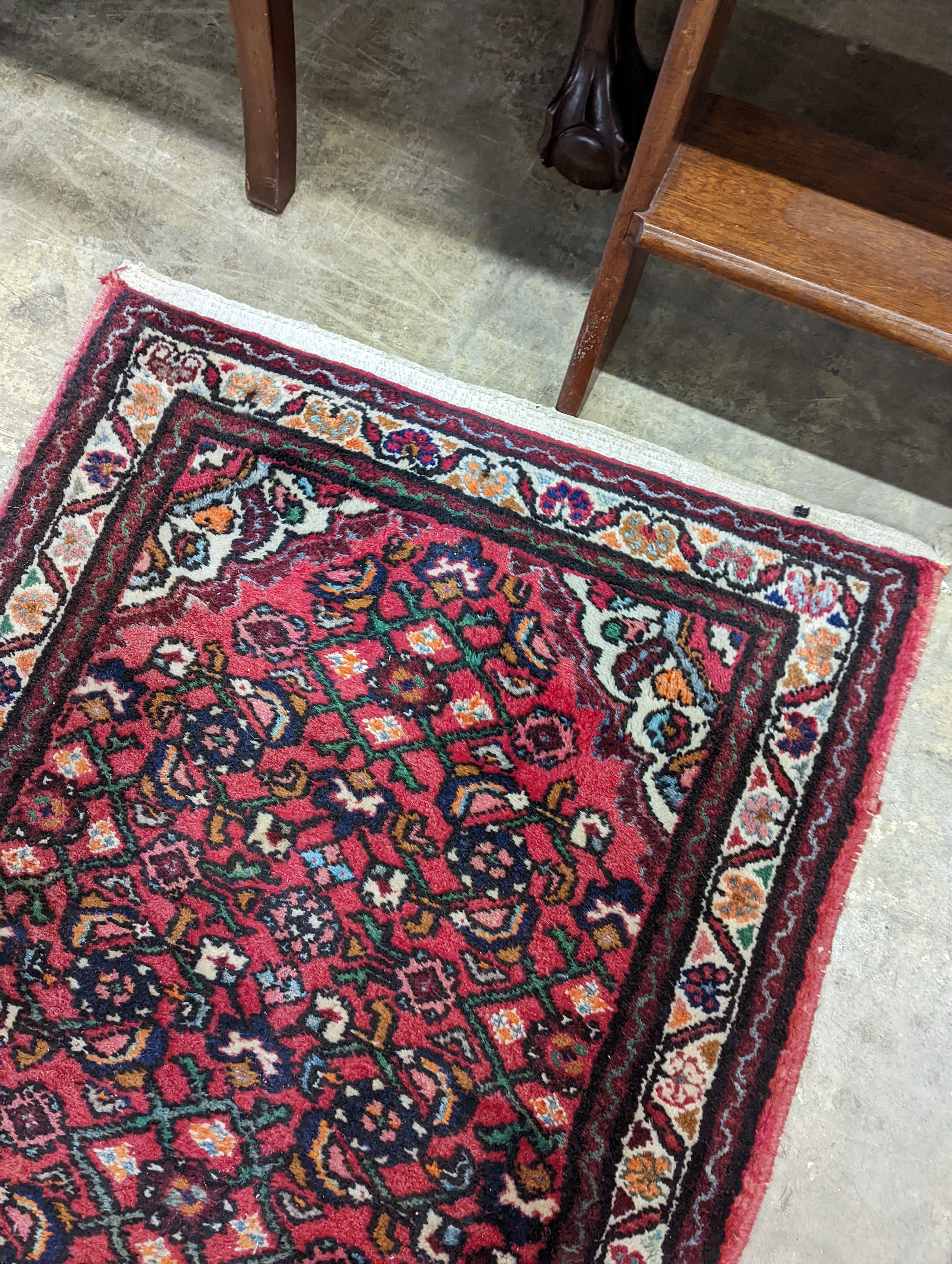 A North West Persian red ground runner and a Bokhara runner, larger approx. 290 x 78cm